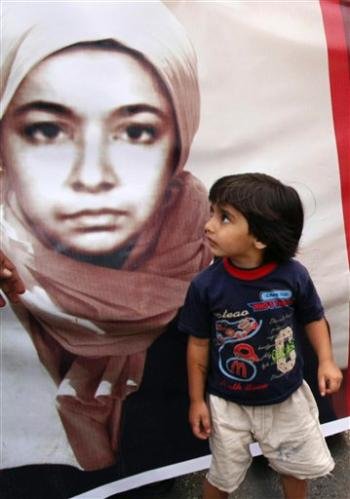 Child Looking at Afia's Poster